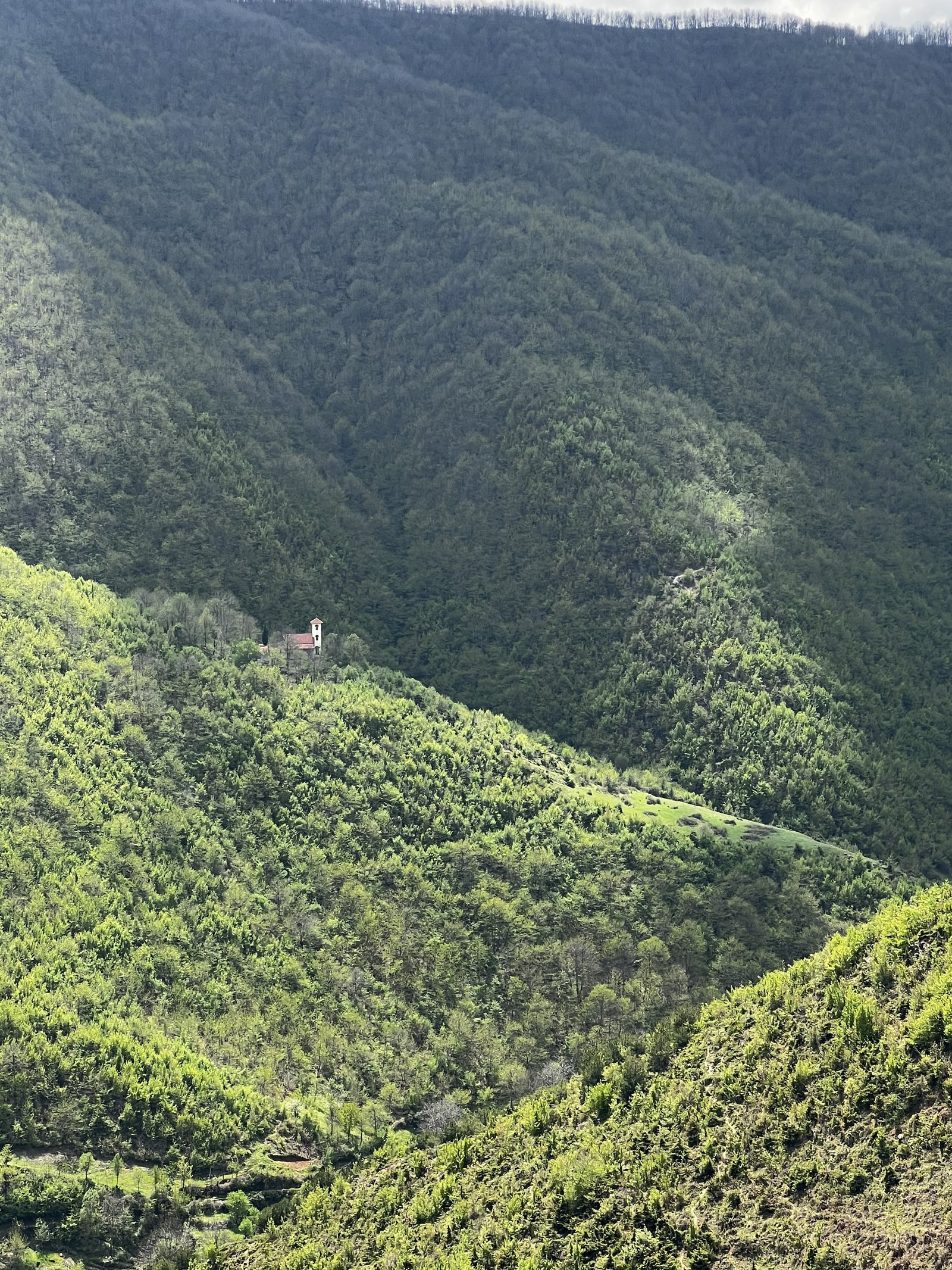 St. Sunday Church seen from a distance in the landscape